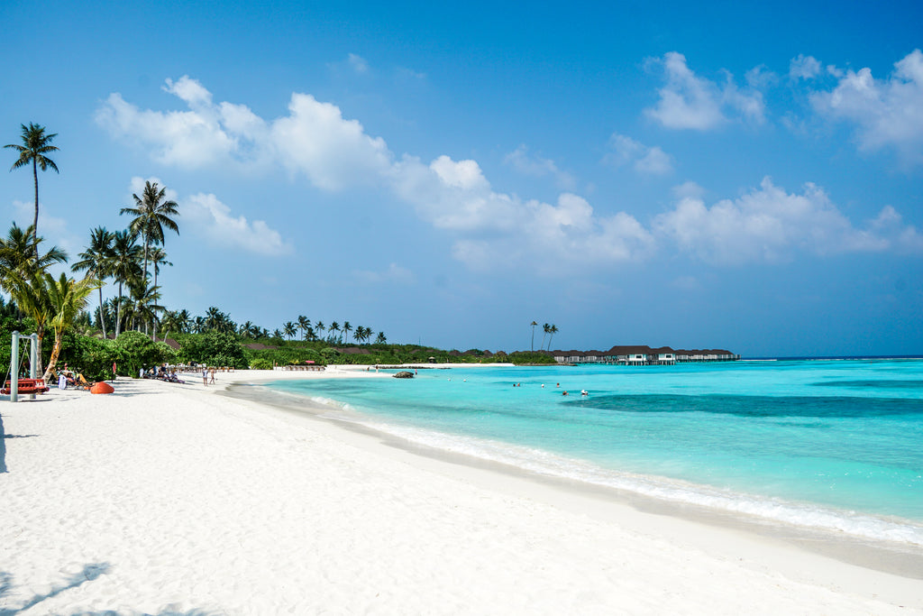 Turquoise lagoon and white sand in the Maldives